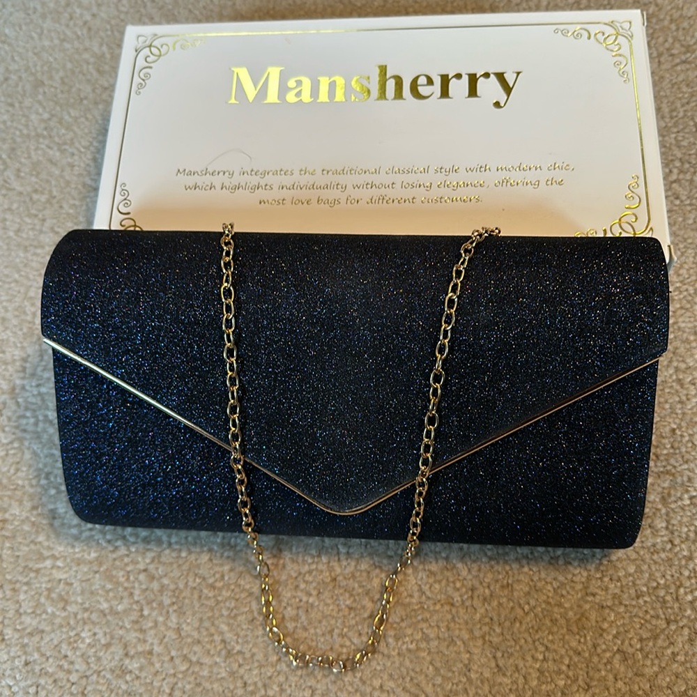 Mansherry evening bag navy blue with sparkles and gold chain.